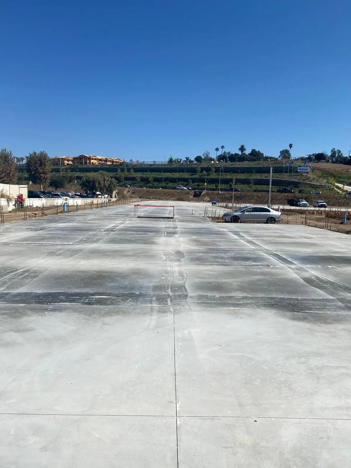 Broad finished concrete surface with saw-cut joints