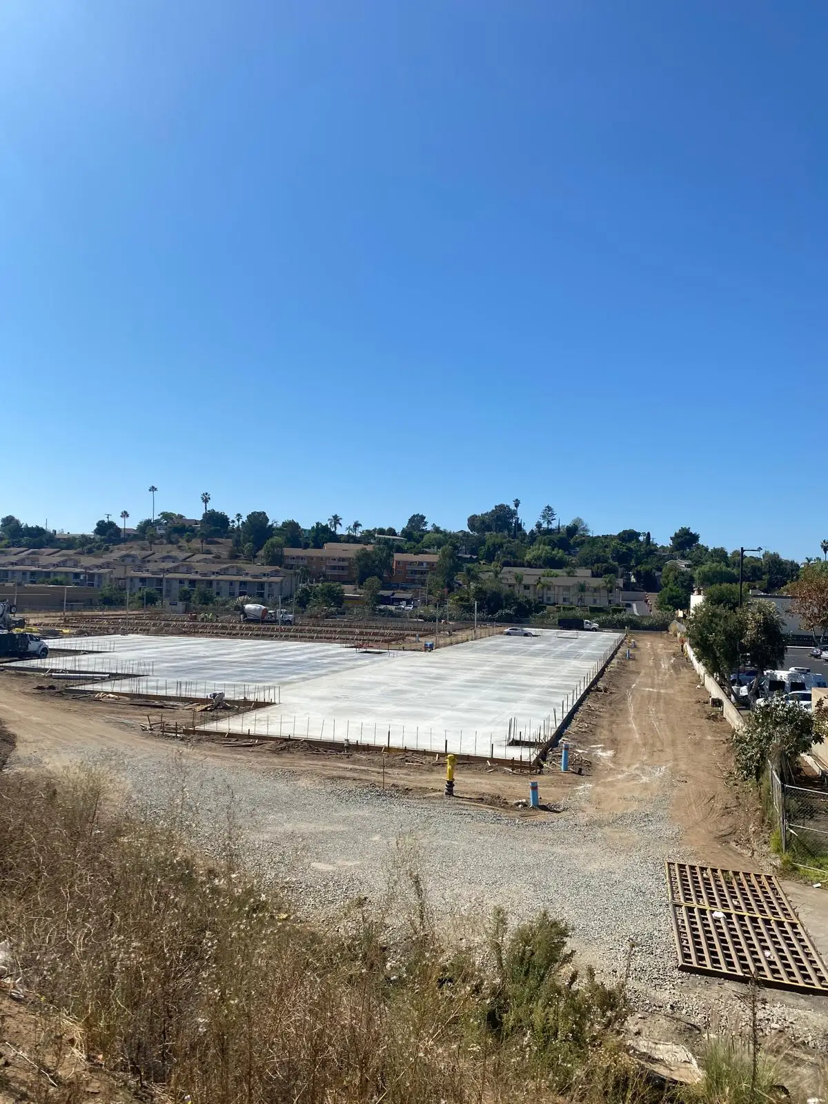 Finished concrete pad seen across the site